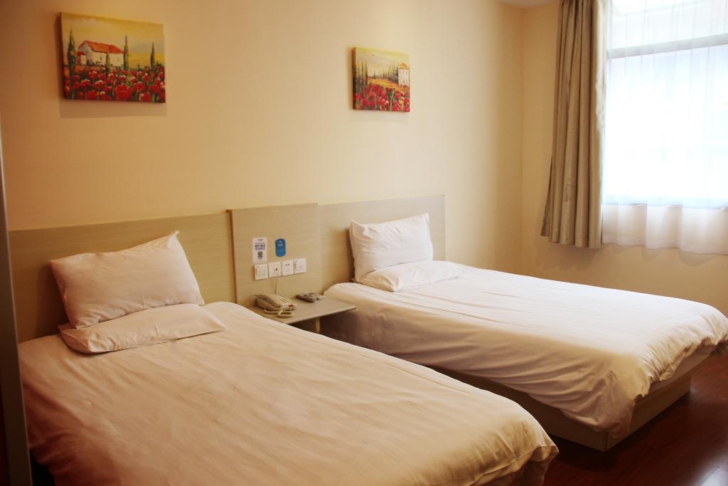 Hanting Hotel Changchun Qimao City Quarto foto