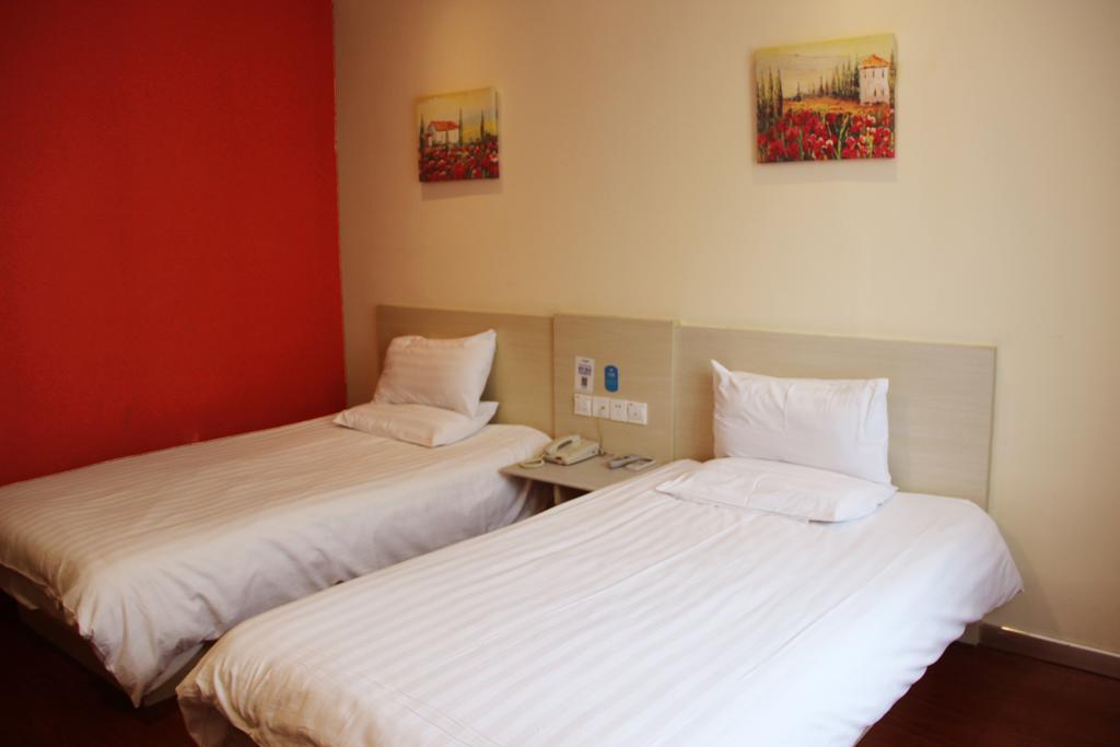 Hanting Hotel Changchun Qimao City Quarto foto