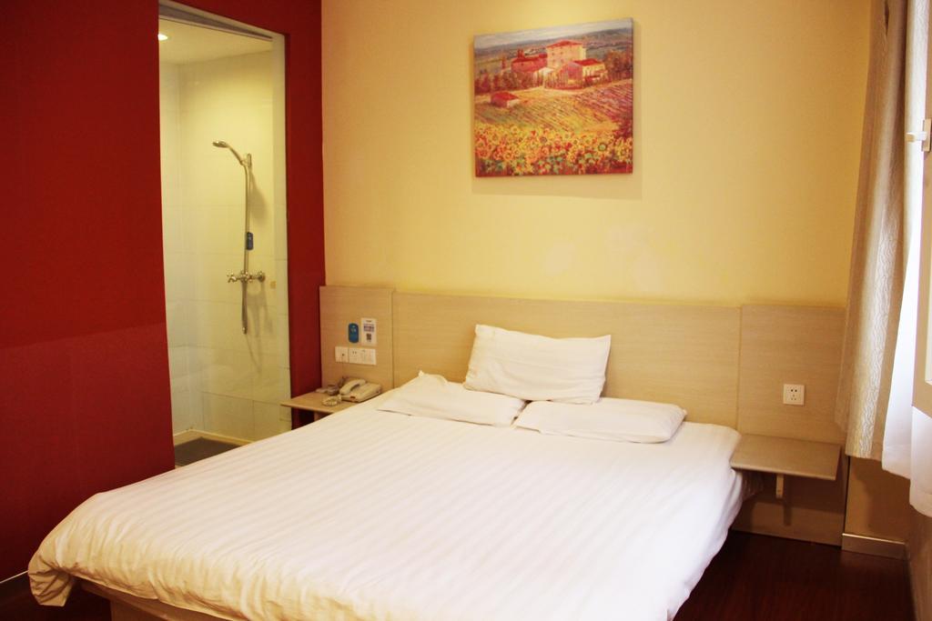 Hanting Hotel Changchun Qimao City Quarto foto